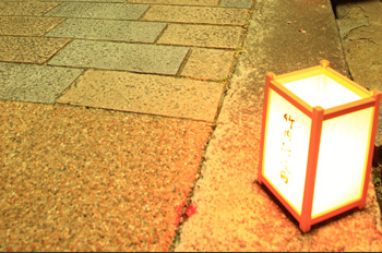 Toro Matsuri (Festival): The light from the lanterns illuminating the stone pavement